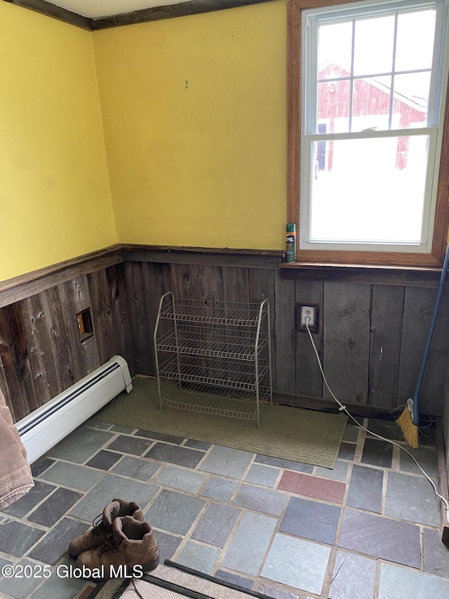 162 Garnet Lake Rd, Thurman, NY 12885 - bathroom featuring a wainscoted wall, a baseboard heating unit, plenty of natural light, and wood walls