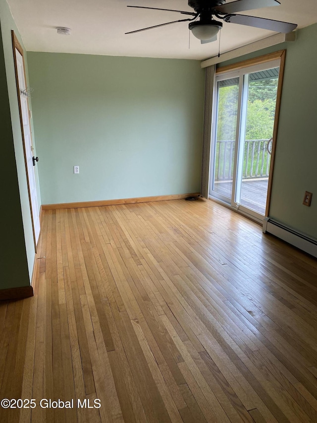 162 Garnet Lake Rd, Thurman, NY 12885 - unfurnished room with ceiling fan, hardwood / wood-style floors, and baseboards