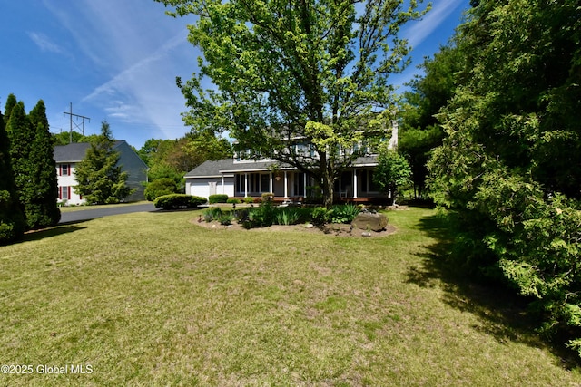 110 Old Coach Rd, Clifton Park, NY 12065 - view of grassy yard featuring an attached garage