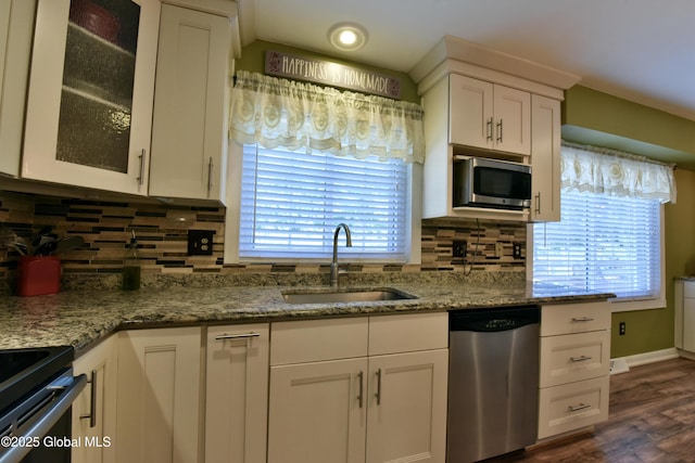 110 Old Coach Rd, Clifton Park, NY 12065 - kitchen featuring stainless steel appliances, a sink, white cabinetry, glass insert cabinets, and dark wood-type flooring