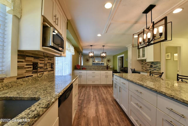 110 Old Coach Rd, Clifton Park, NY 12065 - kitchen featuring stainless steel appliances, a chandelier, decorative backsplash, pendant lighting, and recessed lighting