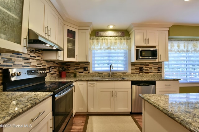 110 Old Coach Rd, Clifton Park, NY 12065 - kitchen with appliances with stainless steel finishes, under cabinet range hood, a sink, and white cabinets