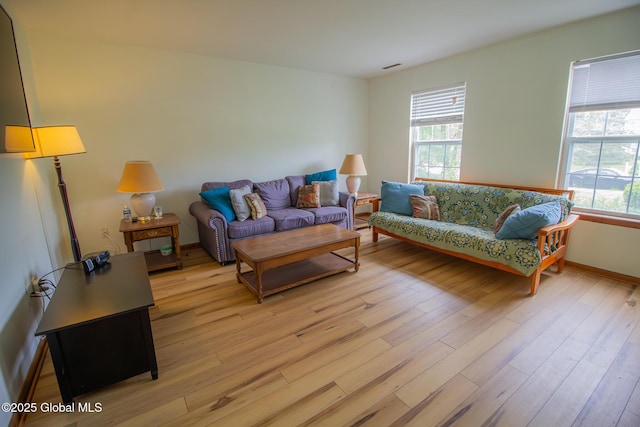 4 Cambridge Way, Ballston Spa, NY 12020 - living room featuring healthy amount of natural light, light wood-style floors, and baseboards