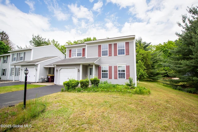 4 Cambridge Way, Ballston Spa, NY 12020 - view of front of house with driveway and a front lawn