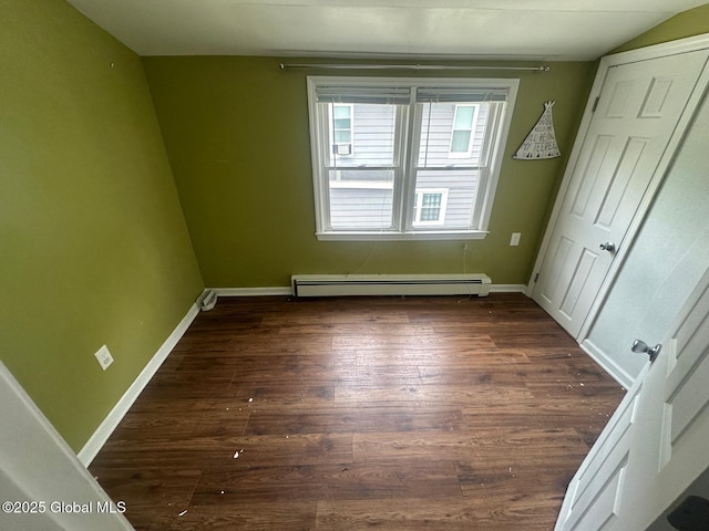 4 Ball Pl, Watervliet, NY 12189 - unfurnished bedroom featuring a baseboard radiator, dark wood-style floors, and baseboards