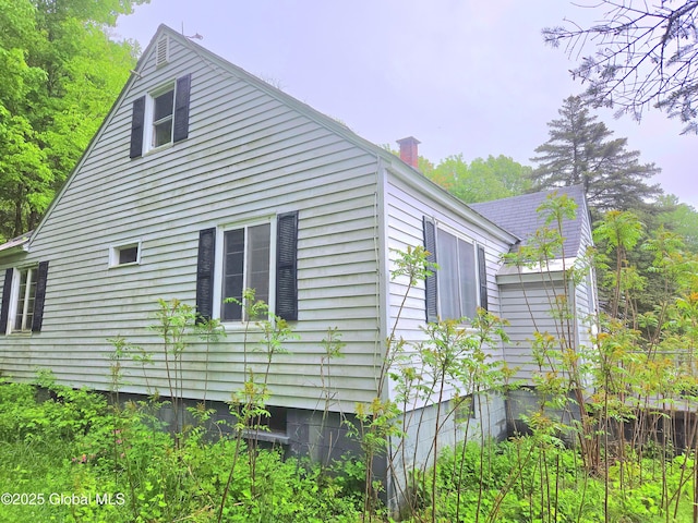 5203 State Route 167, Little Falls, NY 13365 - view of property exterior with a chimney