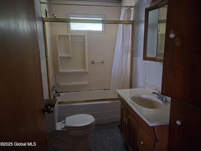 5203 State Route 167, Little Falls, NY 13365 - bathroom featuring vanity, shower / tub combo, toilet, wainscoting, and tile walls