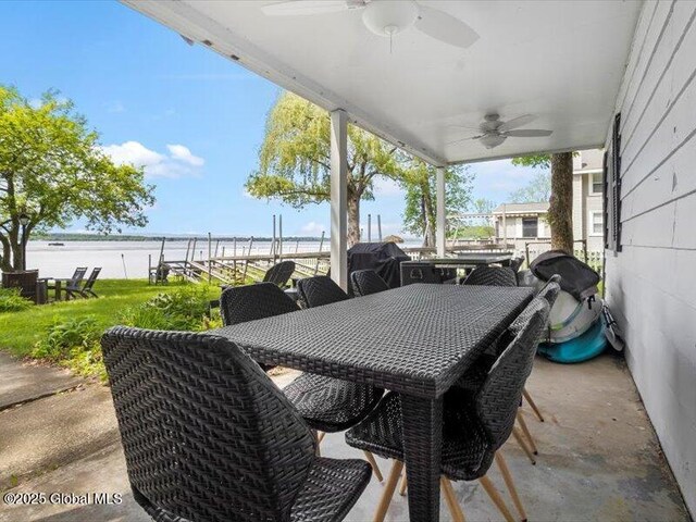 527 Nys Route 9p, Stillwater, NY 12866 - view of patio / terrace with ceiling fan, outdoor dining area, and a water view