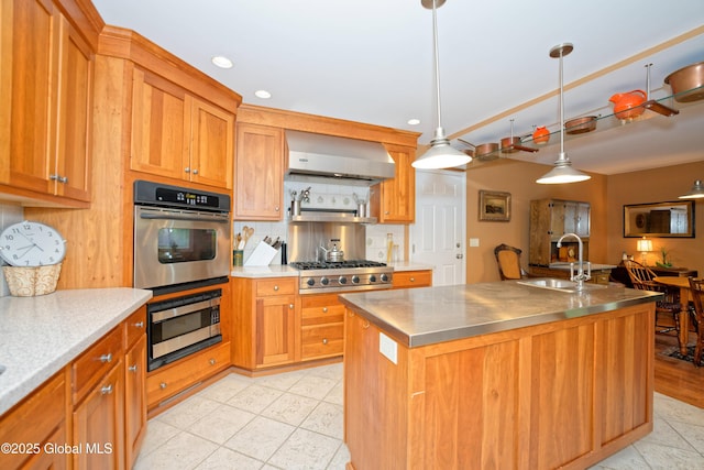 1832 Union St, Niskayuna, NY 12309 - kitchen with stainless steel counters, range hood, a sink, decorative backsplash, and brown cabinetry