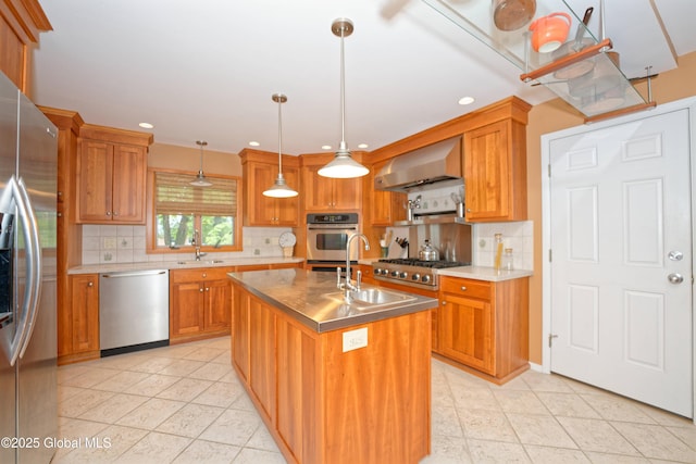 1832 Union St, Niskayuna, NY 12309 - kitchen featuring appliances with stainless steel finishes, wall chimney exhaust hood, a sink, brown cabinets, and tasteful backsplash