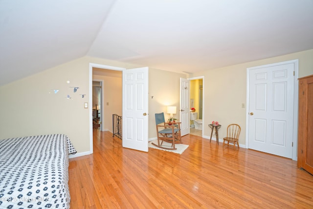 1832 Union St, Niskayuna, NY 12309 - bedroom featuring light wood finished floors, vaulted ceiling, and baseboards