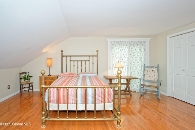 1832 Union St, Niskayuna, NY 12309 - bedroom with wood finished floors, lofted ceiling, and baseboards
