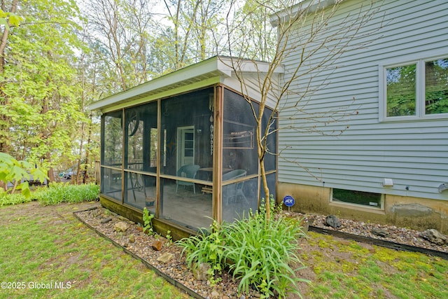 1832 Union St, Niskayuna, NY 12309 - view of home's exterior with a sunroom