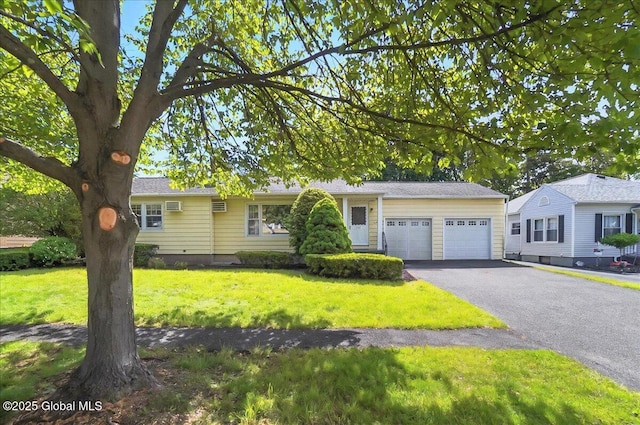 1324 Keyes Ave, Schenectady, NY 12309 - ranch-style house featuring an attached garage, a front yard, and driveway