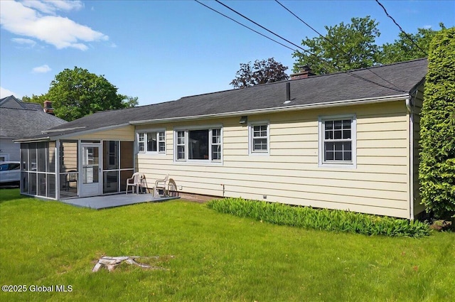 1324 Keyes Ave, Schenectady, NY 12309 - back of house featuring a sunroom, a lawn, a chimney, and a patio