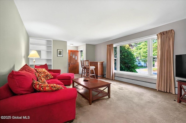 1324 Keyes Ave, Schenectady, NY 12309 - living area featuring a baseboard heating unit, carpet floors, healthy amount of natural light, and built in shelves