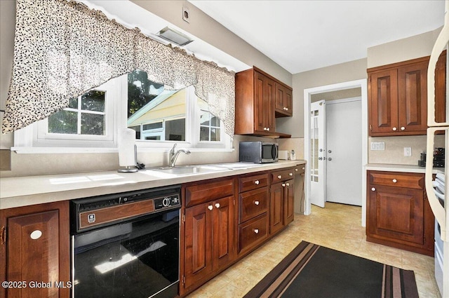 1324 Keyes Ave, Schenectady, NY 12309 - kitchen featuring dishwasher, light countertops, and stainless steel microwave