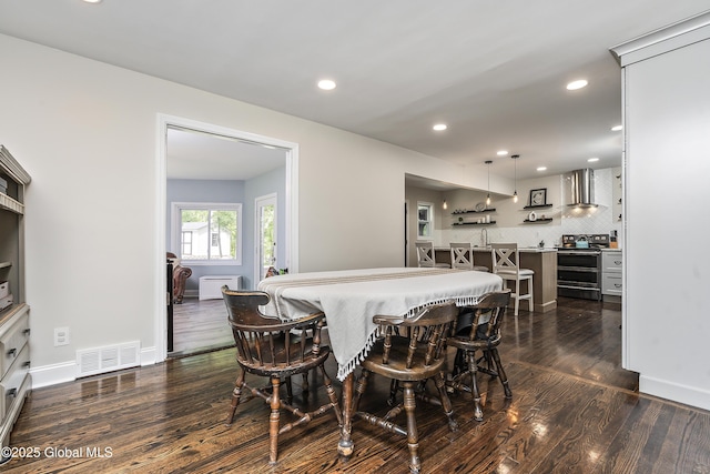 91 Gorman Rd, Menands, NY 12204 - dining room featuring dark wood-type flooring, recessed lighting, and baseboards