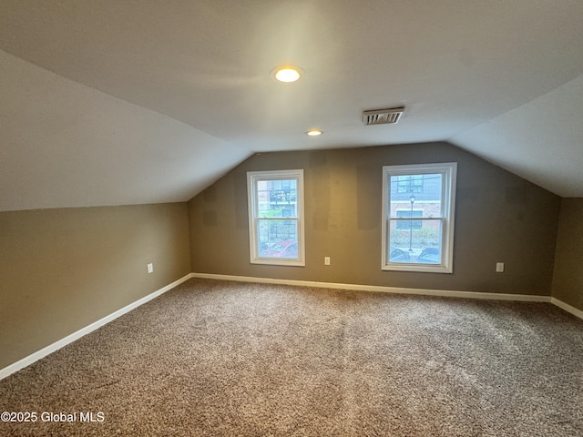 54 Sargent St, Cohoes, NY 12047 - additional living space featuring vaulted ceiling, baseboards, and carpet floors