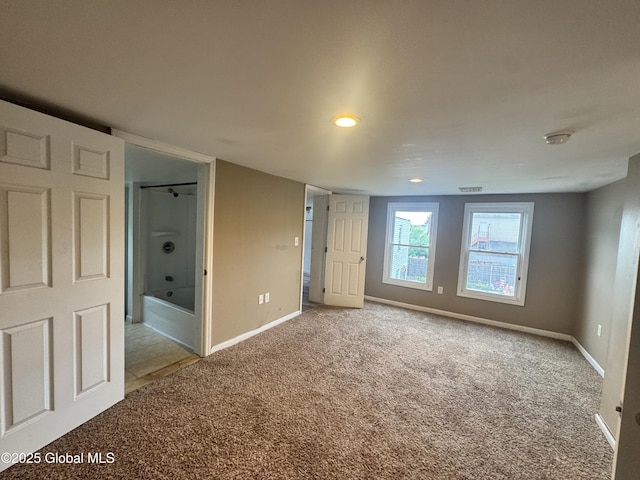 54 Sargent St, Cohoes, NY 12047 - carpeted empty room featuring baseboards and recessed lighting