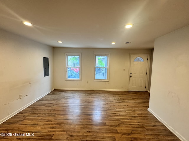 54 Sargent St, Cohoes, NY 12047 - foyer featuring dark wood-type flooring, recessed lighting, baseboards, and electric panel