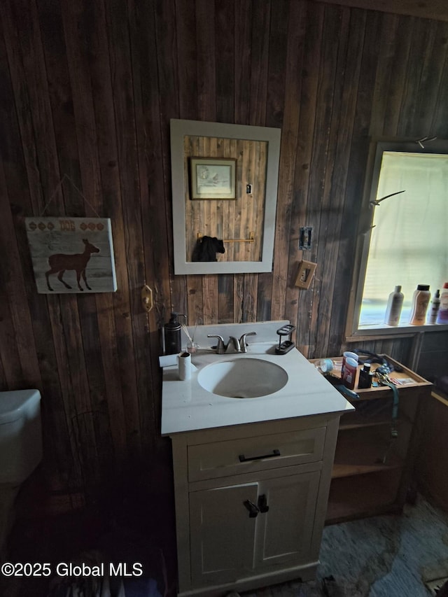 479 Junction Rd, Esperance, NY 12066 - half bath featuring wood walls, vanity, and toilet