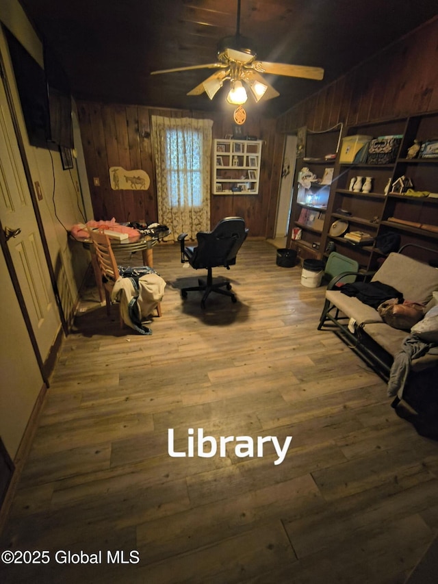 479 Junction Rd, Esperance, NY 12066 - office with wood walls, hardwood / wood-style flooring, and a ceiling fan