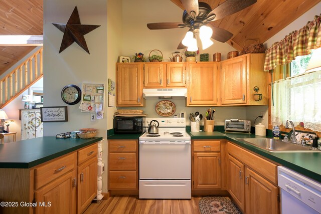268 Dodd Hill Rd, Hague, NY 12836 - kitchen with white appliances, under cabinet range hood, a sink, light wood-style flooring, and vaulted ceiling
