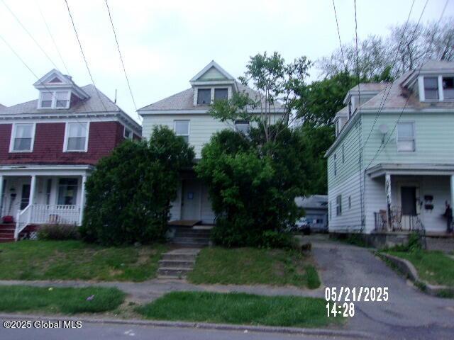 1745 Becker St, Schenectady, NY 12304 - american foursquare style home featuring covered porch
