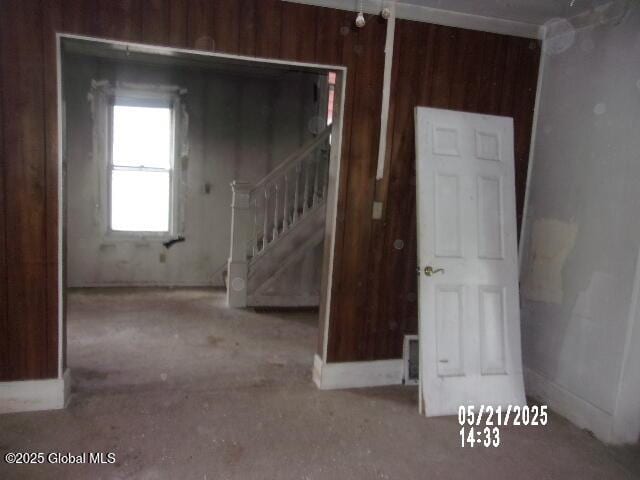 1745 Becker St, Schenectady, NY 12304 - empty room featuring stairs and wood walls