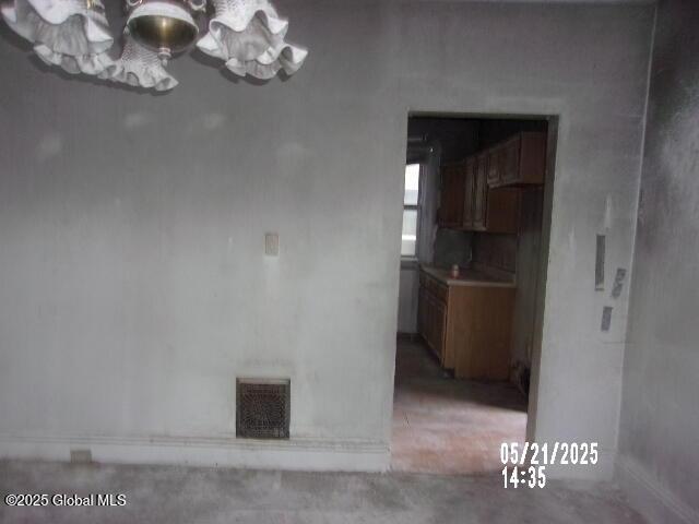 1745 Becker St, Schenectady, NY 12304 - unfurnished dining area with concrete floors