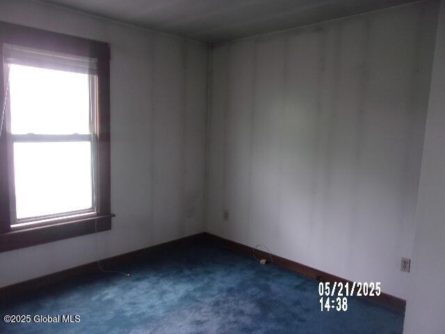 1745 Becker St, Schenectady, NY 12304 - spare room featuring plenty of natural light and dark carpet