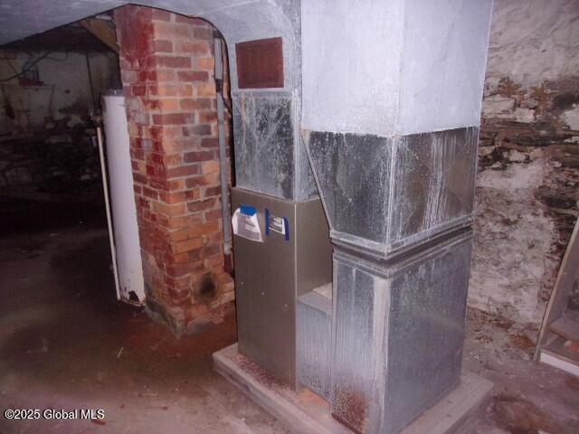 1745 Becker St, Schenectady, NY 12304 - basement view of heating unit and concrete flooring
