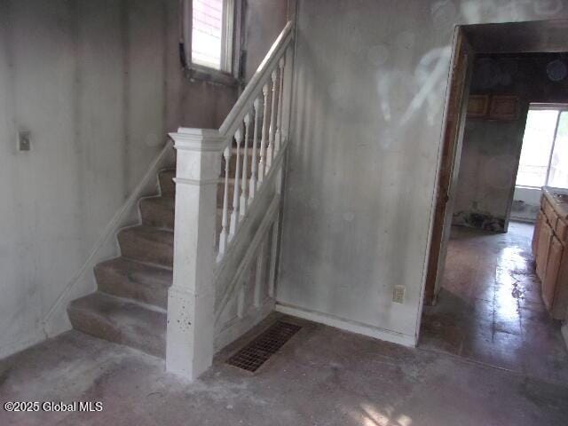 1745 Becker St, Schenectady, NY 12304 - stairway featuring unfinished concrete floors