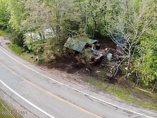 5244 State Highway 29a, Stratford, NY 13470 - aerial view of property and surrounding area with a heavily wooded area
