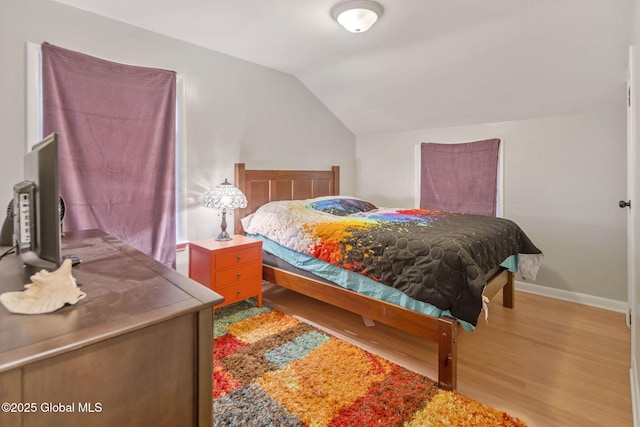 1920 Dover Rd, Niskayuna, NY 12309 - bedroom with wood finished floors, vaulted ceiling, and baseboards