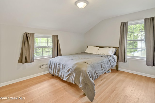 1920 Dover Rd, Niskayuna, NY 12309 - bedroom featuring vaulted ceiling, baseboards, and light wood-style flooring