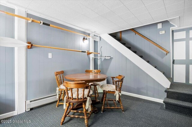 113 New Vermont Rd, Bolton, NY 12814 - dining area featuring a baseboard heating unit, stairway, carpet, and baseboards