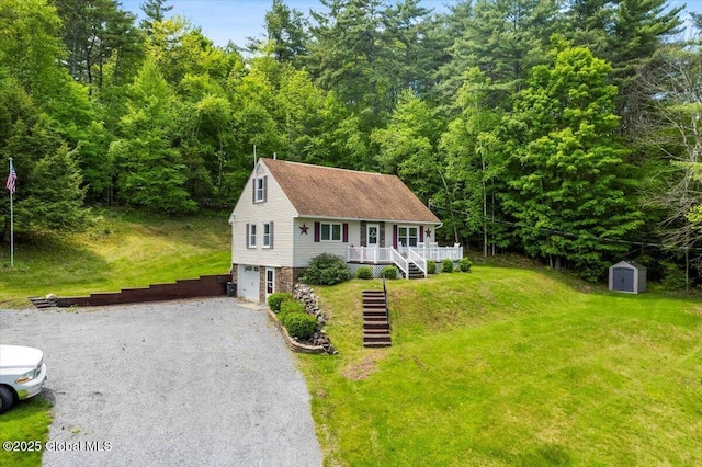113 New Vermont Rd, Bolton, NY 12814 - view of front of house with stairway, covered porch, gravel driveway, an attached garage, and a front yard