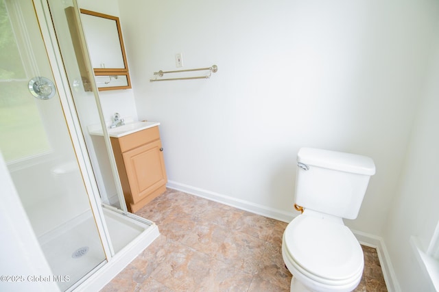 56 Boulevard, Queensbury, NY 12804 - full bath featuring vanity, a stall shower, toilet, and baseboards