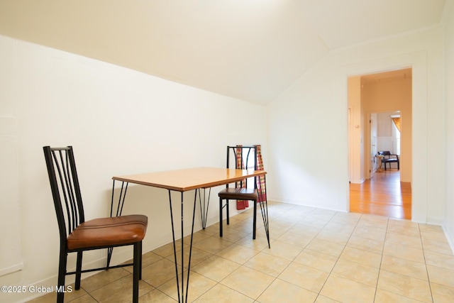 56 Boulevard, Queensbury, NY 12804 - dining space featuring vaulted ceiling and light tile patterned floors