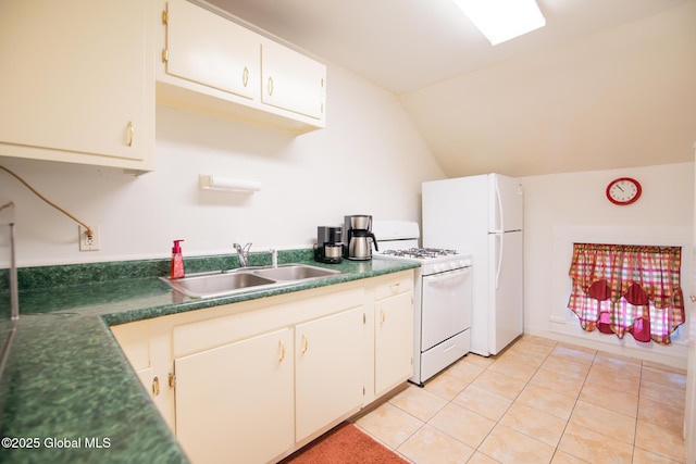 56 Boulevard, Queensbury, NY 12804 - kitchen with white appliances, a sink, lofted ceiling, dark countertops, and light tile patterned flooring