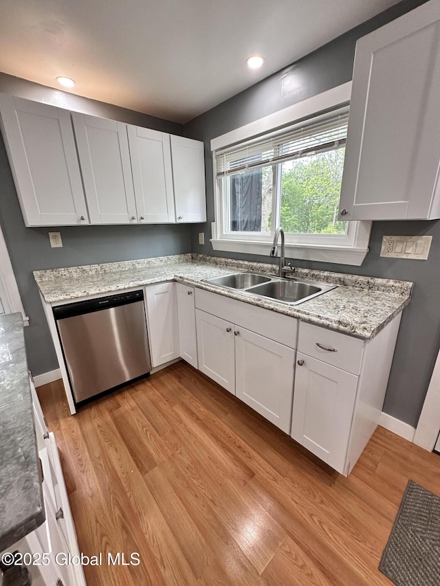 134 Moyer St, Canajoharie, NY 13317 - kitchen with dishwasher, a sink, light wood finished floors, white cabinetry, and recessed lighting