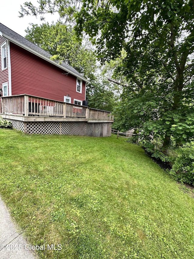 134 Moyer St, Canajoharie, NY 13317 - view of grassy yard with a deck