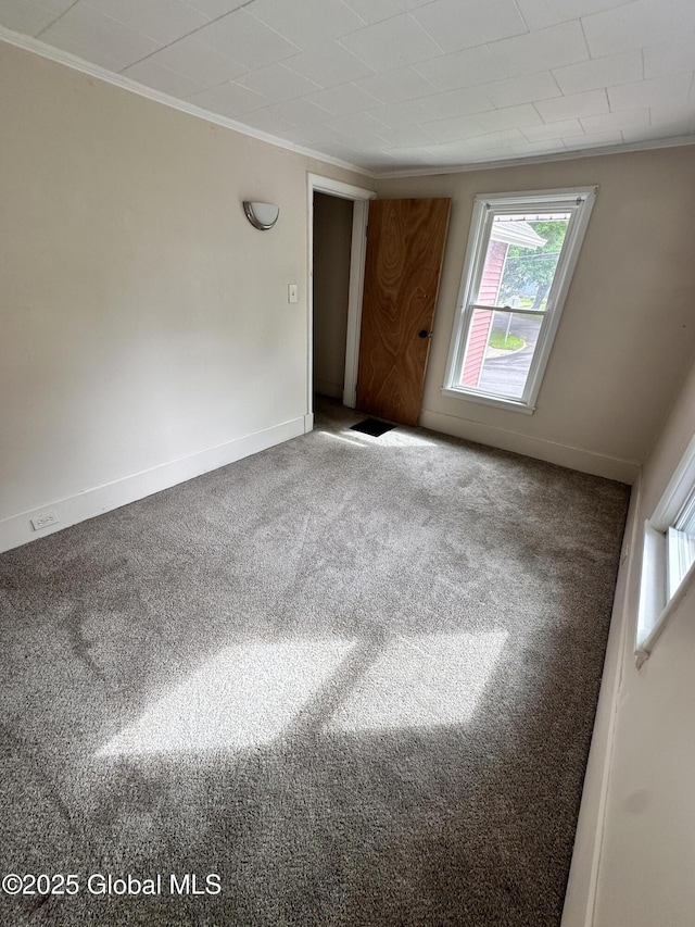 134 Moyer St, Canajoharie, NY 13317 - carpeted empty room featuring ornamental molding, plenty of natural light, and baseboards