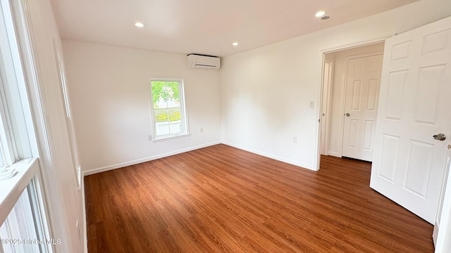 27 Major Dickinson Ave, Stillwater, NY 12170 - empty room with an AC wall unit, wood finished floors, baseboards, and recessed lighting