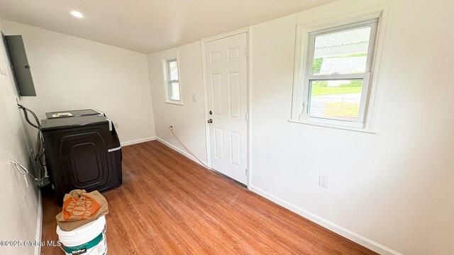 27 Major Dickinson Ave, Stillwater, NY 12170 - washroom featuring light wood-type flooring, baseboards, washer / dryer, and electric panel