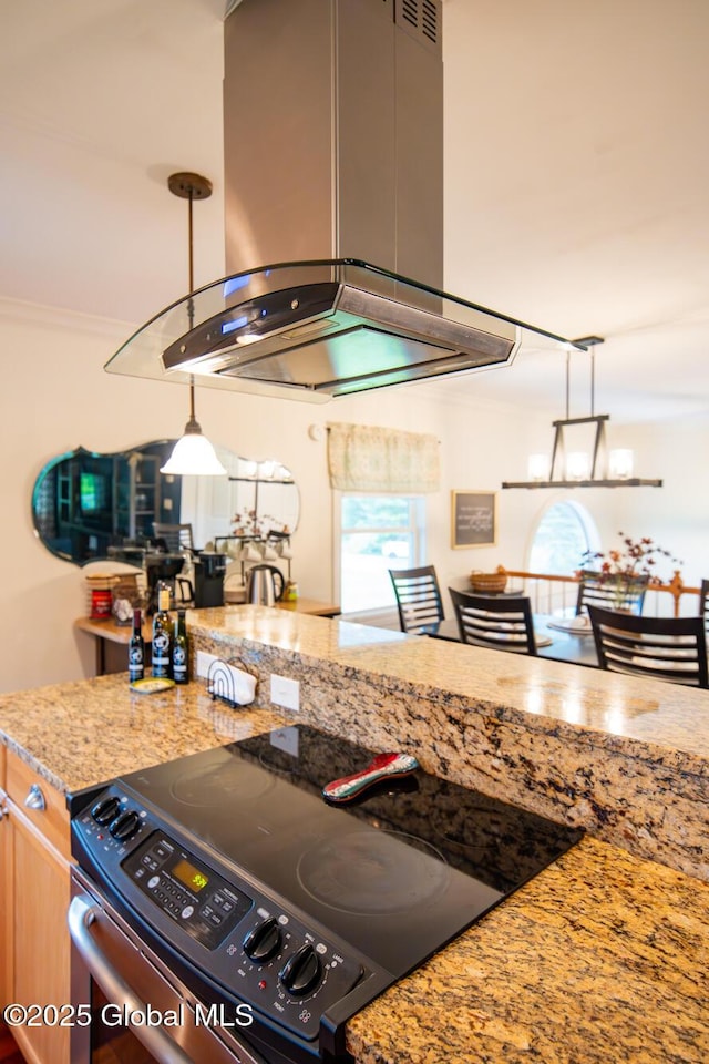 16 Dinu Dr, Warrensburg, NY 12885 - kitchen with electric range oven, island range hood, decorative light fixtures, crown molding, and light stone counters