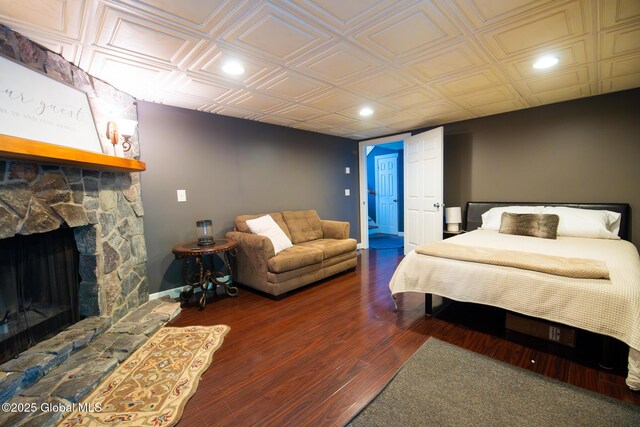 16 Dinu Dr, Warrensburg, NY 12885 - bedroom with recessed lighting, an ornate ceiling, a fireplace, wood finished floors, and baseboards