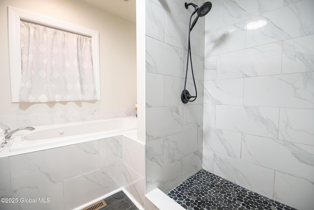 16 Dinu Dr, Warrensburg, NY 12885 - bathroom featuring a garden tub and tiled shower